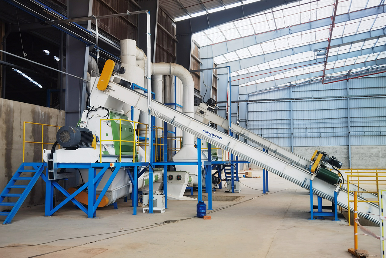 Complete 12 t/h biomass pellet production line layout showing crusher, dryer, and pellet mill stations